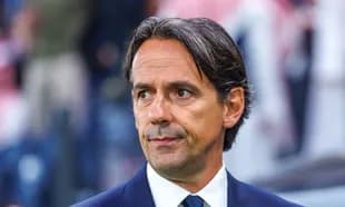 Football manager observing the match from sidelines