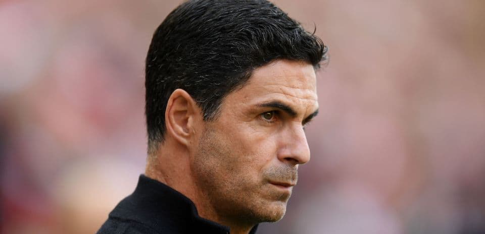 Manager focused during match at stadium
