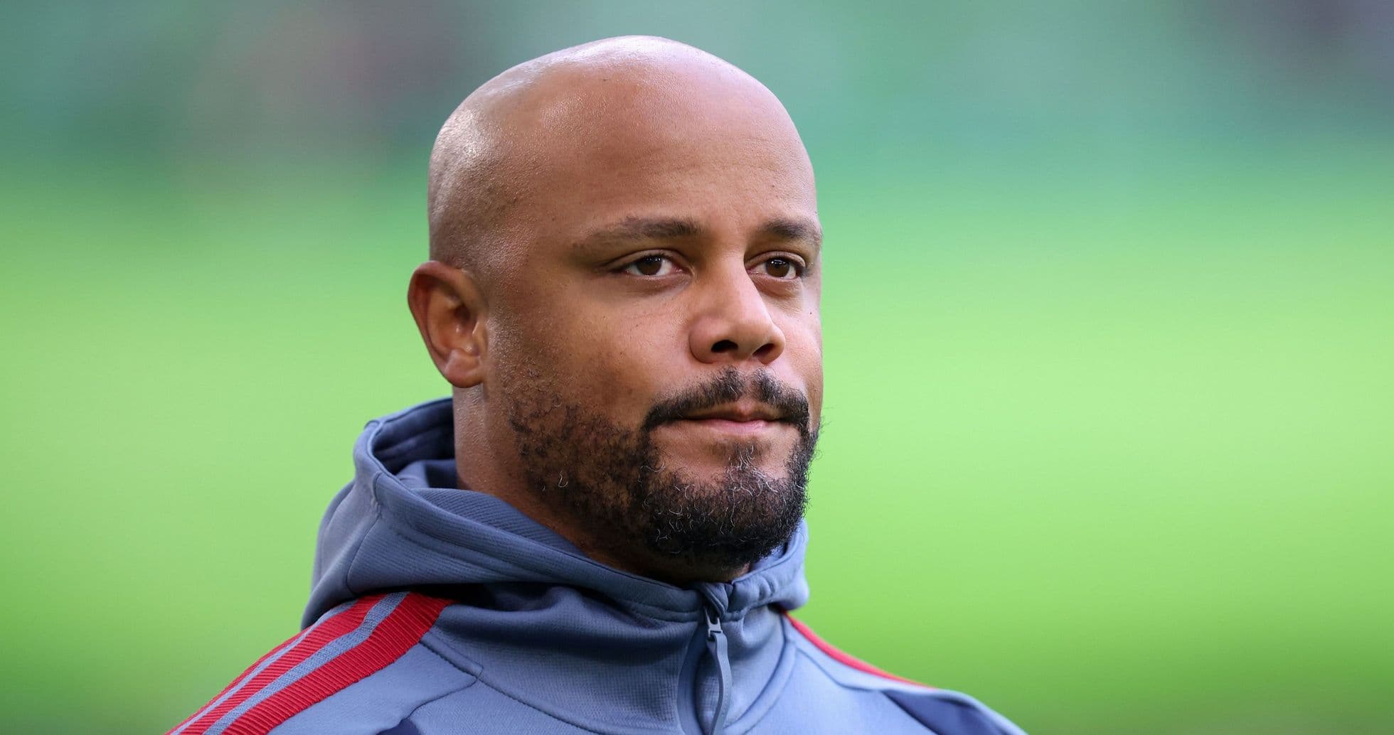 Coach observing players during training session
