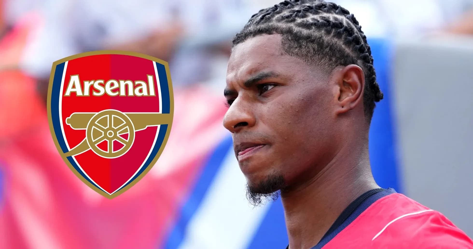 Player in Arsenal jersey with braided hairstyle