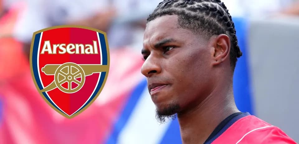 Player in Arsenal jersey with braided hairstyle