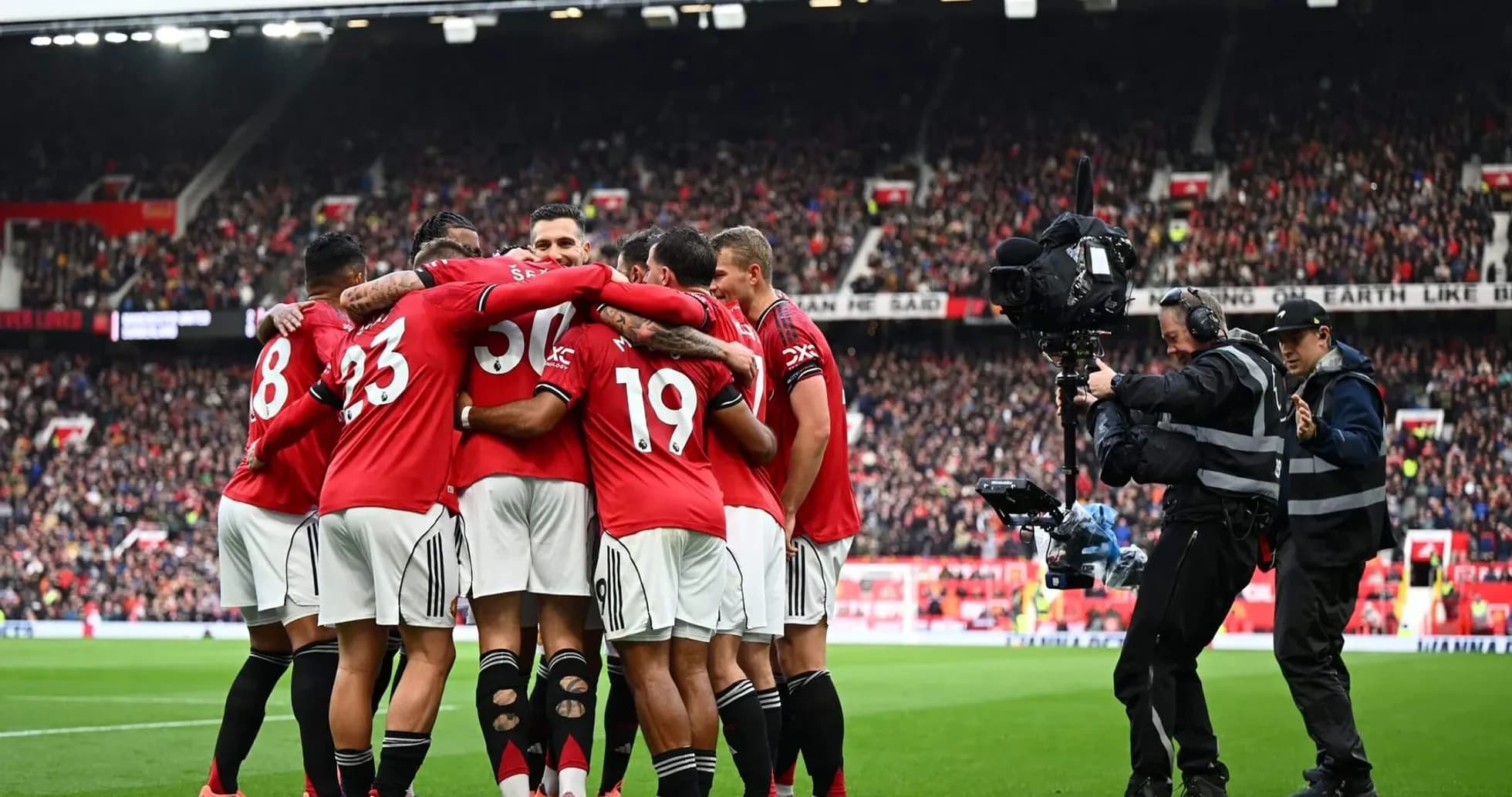 Manchester United players celebrating a goal