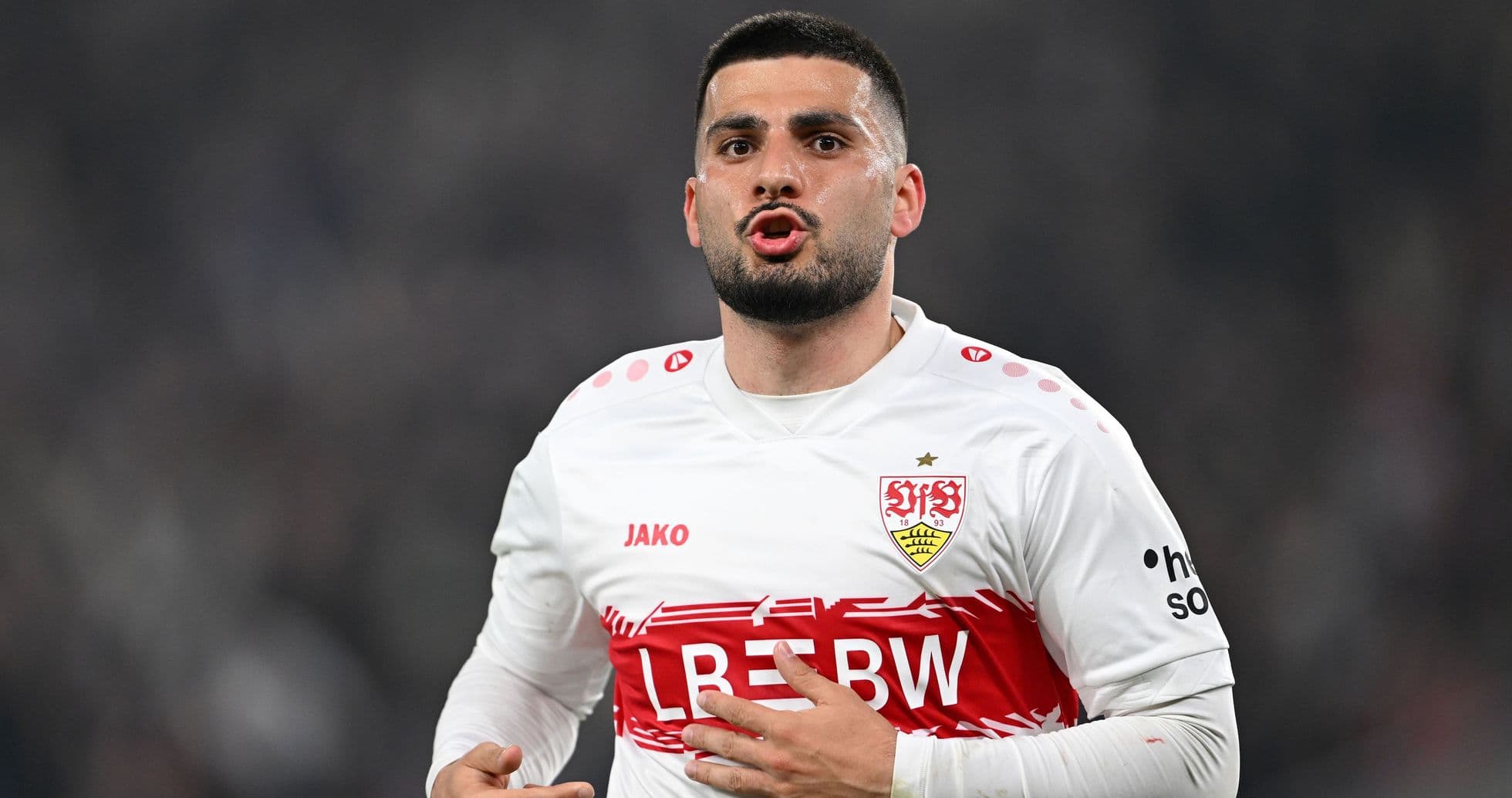 Player in Stuttgart jersey gesturing during match