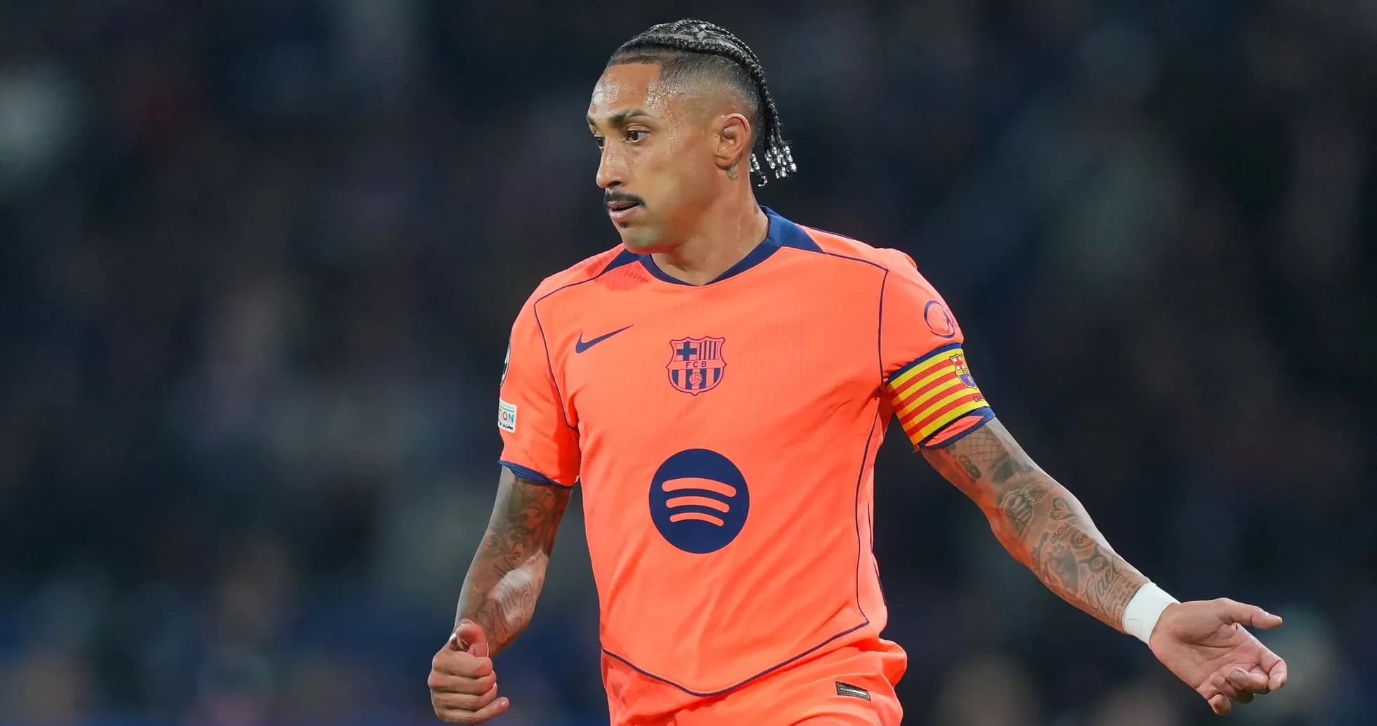 Player wearing Barcelona kit during match action
