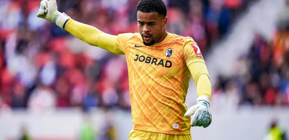 Goalkeeper signaling during a football match