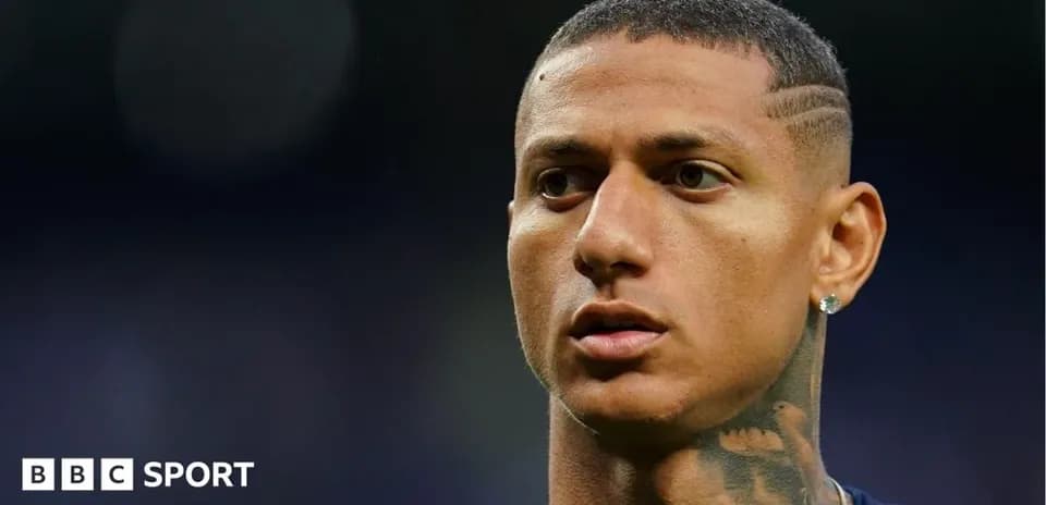 Player with close-cropped hair and tattooed neck