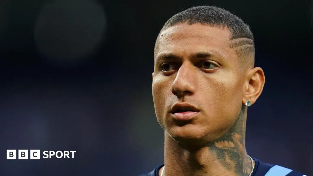 Player with close-cropped hair and tattooed neck