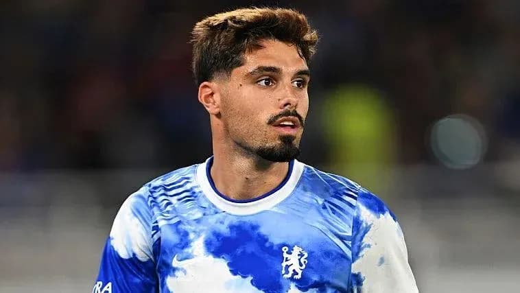 Player wearing Chelsea jersey on the field