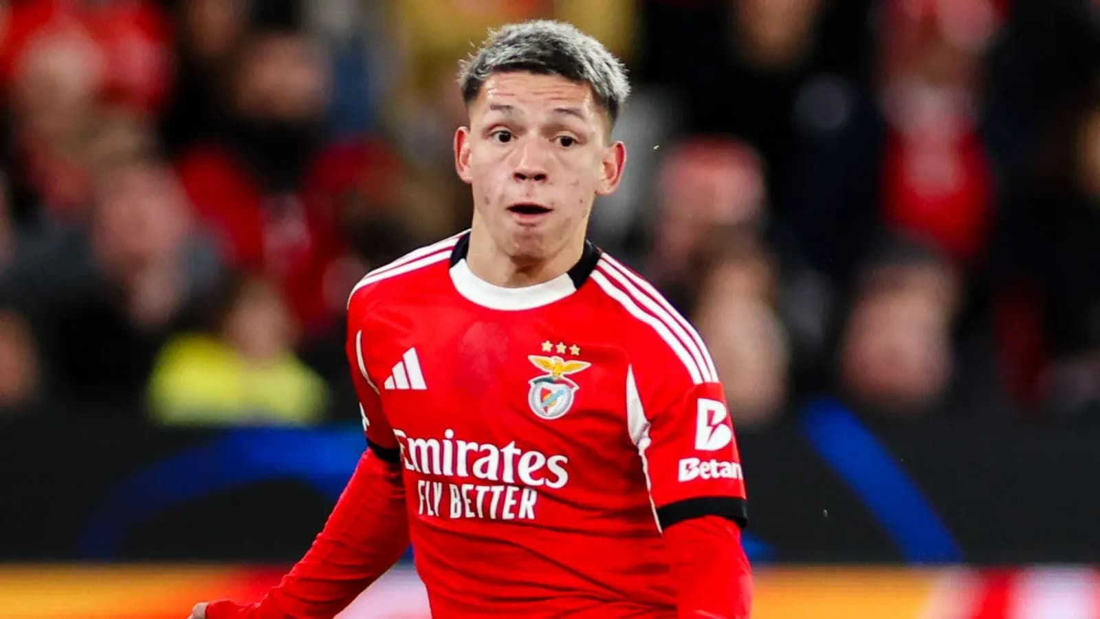 Benfica player running during a match
