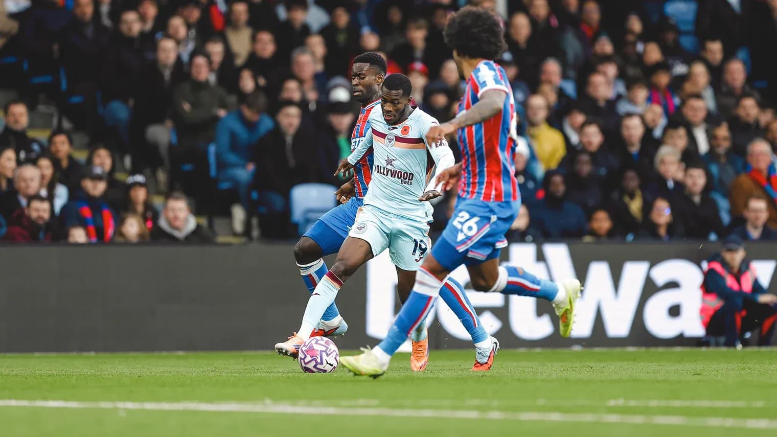 Brentford player in action against Crystal Palace