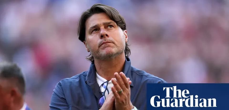 Coach looking up with hands clasped in prayer