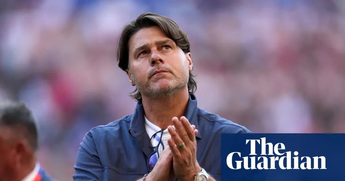 Coach looking up with hands clasped in prayer
