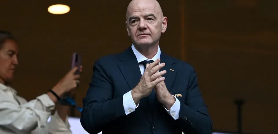 FIFA president Gianni Infantino clapping at event