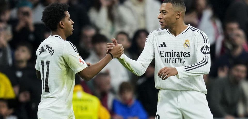 Rodrygo and Mbappé celebrating during match