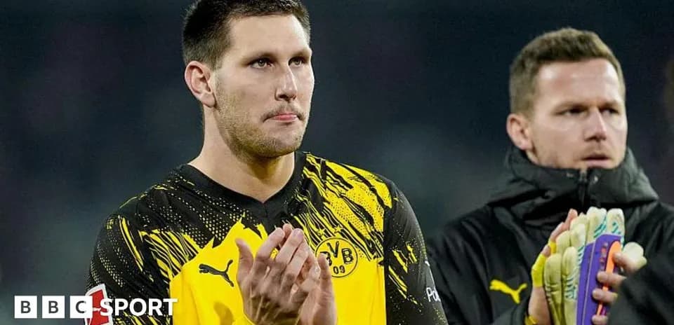 Goalkeeper applauding after match with teammate
