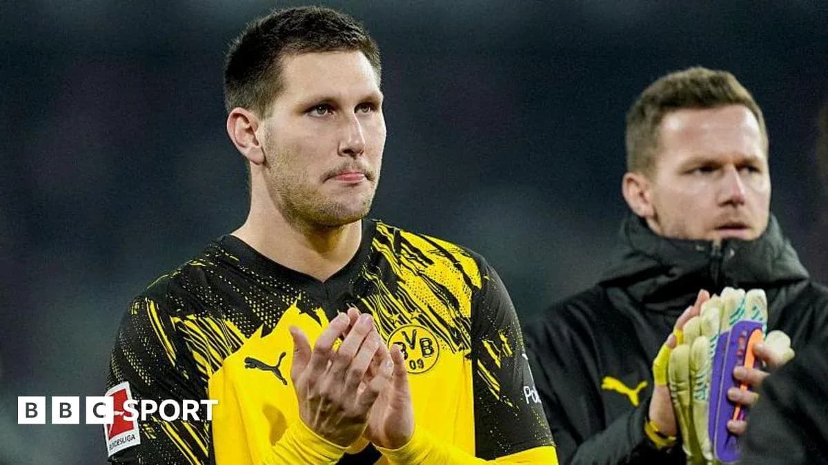 Goalkeeper applauding after match with teammate