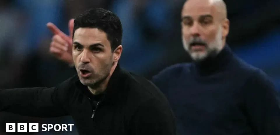 Two football managers interacting on the sidelines