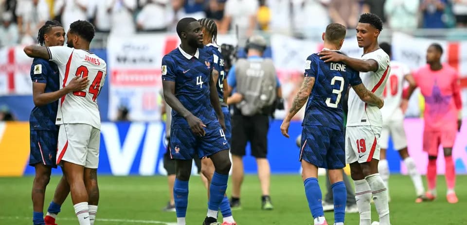 Players exchanging hugs after the match
