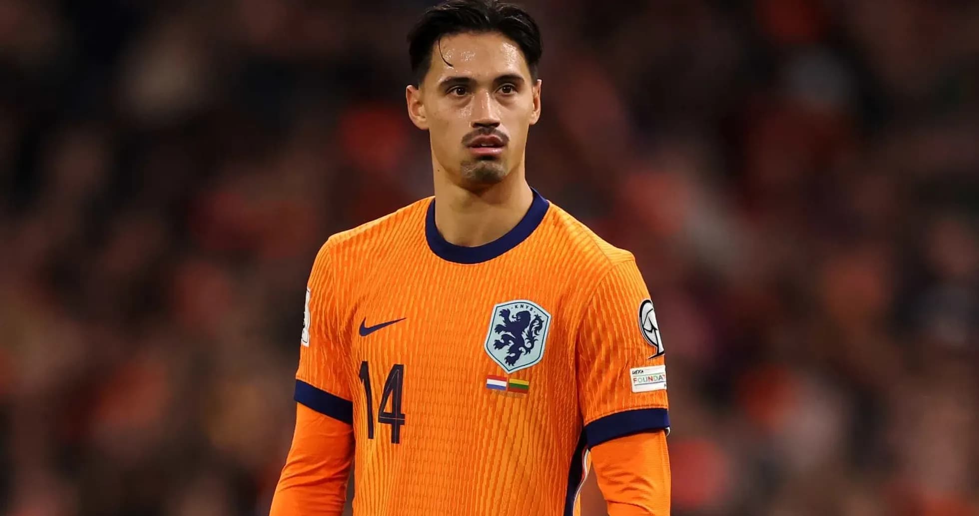 Player in orange Netherlands jersey during match