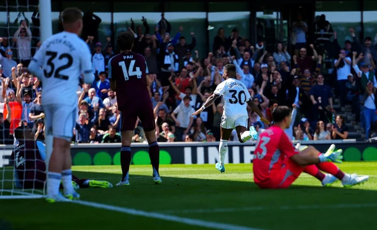 Fulham player celebrating a goal against Aston Villa