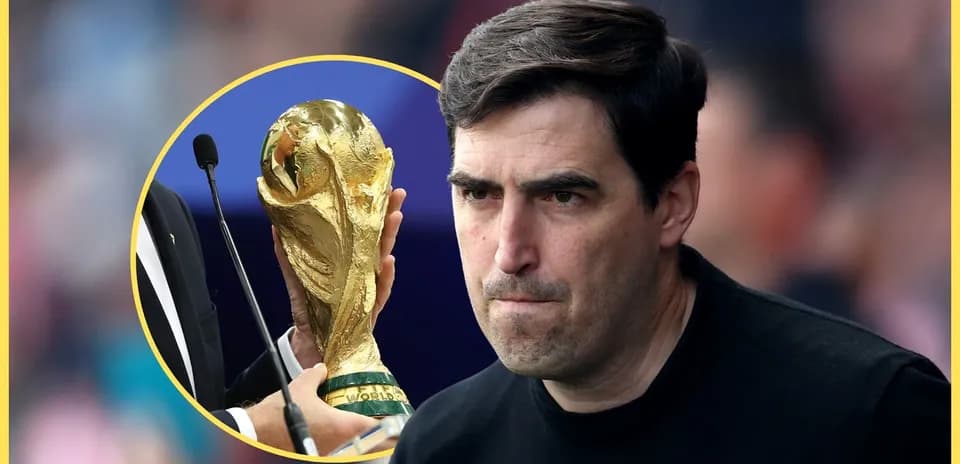 Coach with World Cup trophy in background