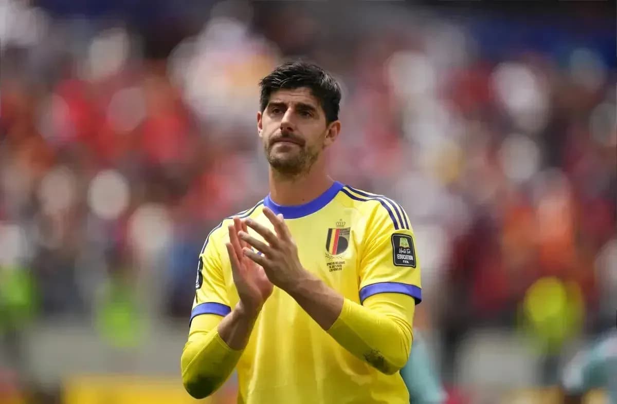 Goalkeeper clapping in yellow kit during match