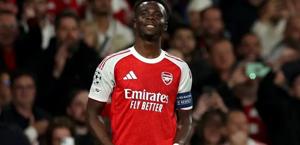 Arsenal player celebrating during Champions League match