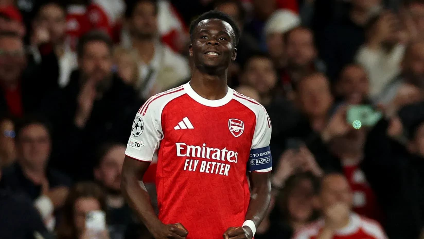 Arsenal player celebrating during Champions League match