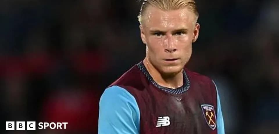 Player in West Ham kit during match warm-up