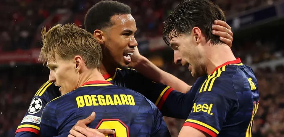 Players celebrating a goal during a match