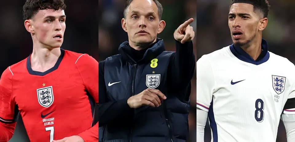 Three football players in England kits on field