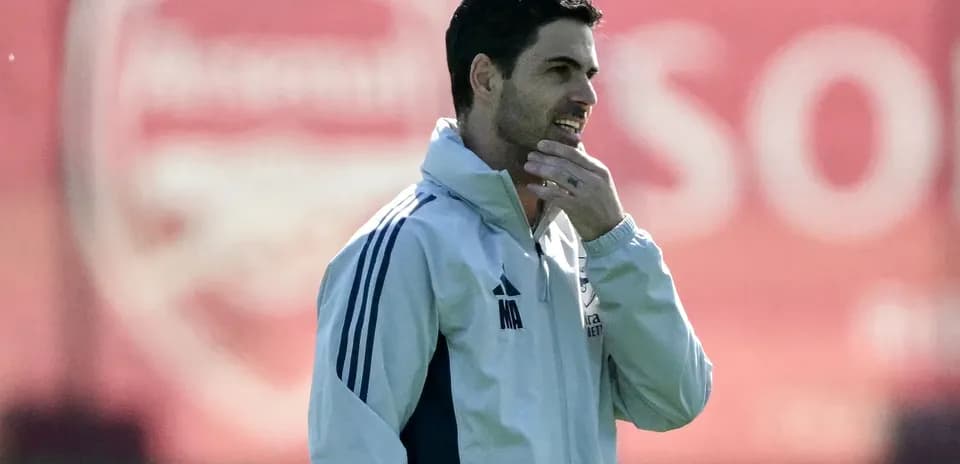 Arsenal manager during training session at pitch