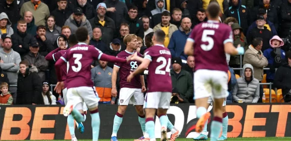 Burnley players celebrating a goal during match