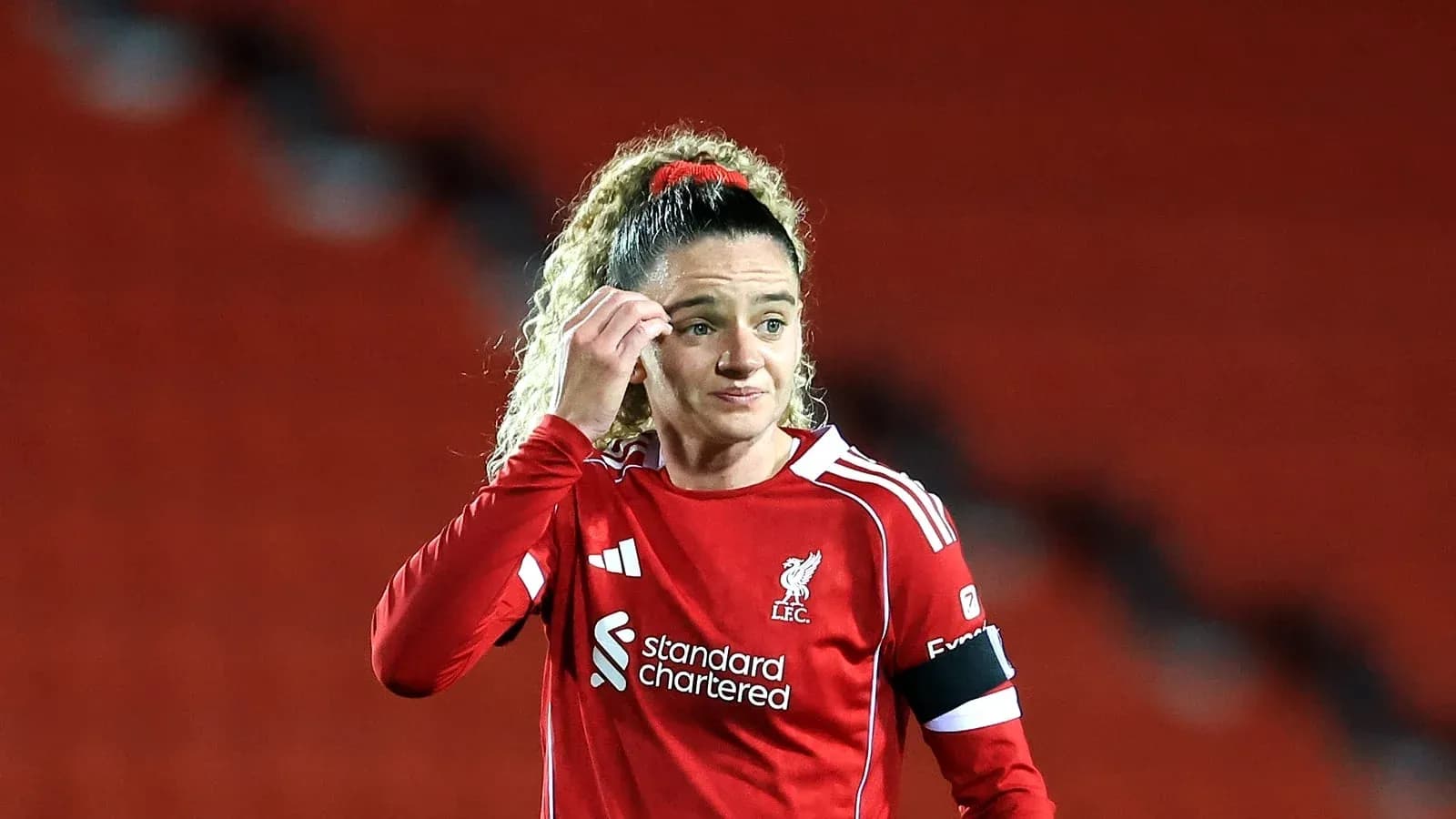 Player in red Liverpool kit during match