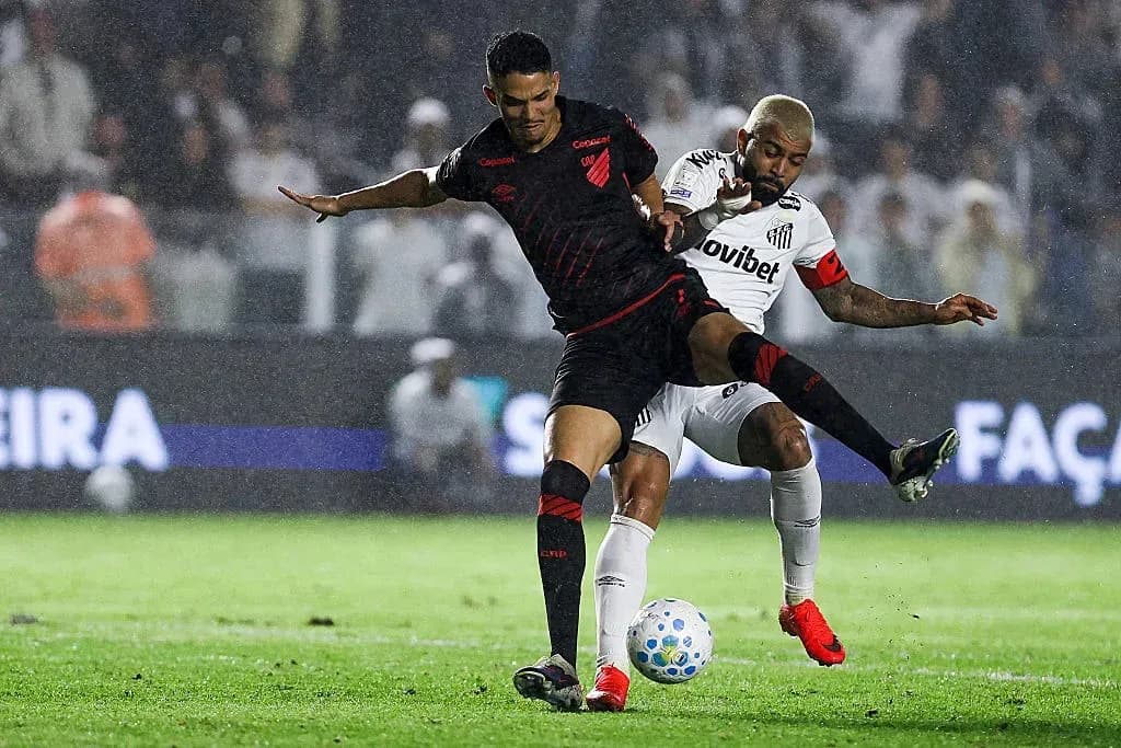 Two players battling for the ball during match