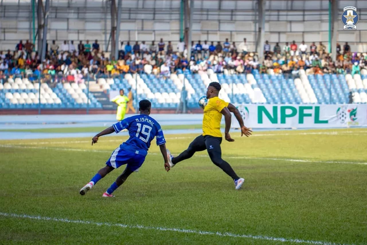 Player attempting to score against the goalkeeper