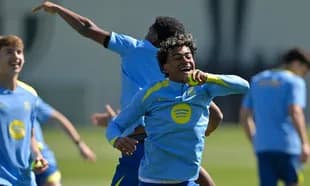 Players celebrating during a training session