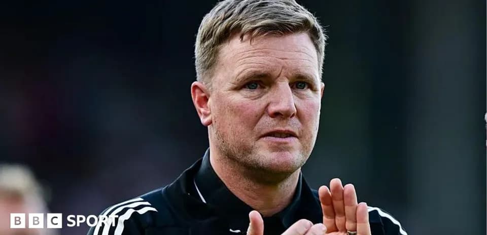 Manager clapping during match on the sidelines