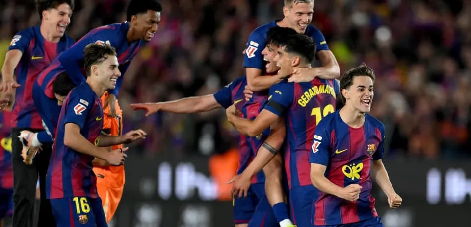 Barcelona players celebrating a goal during match