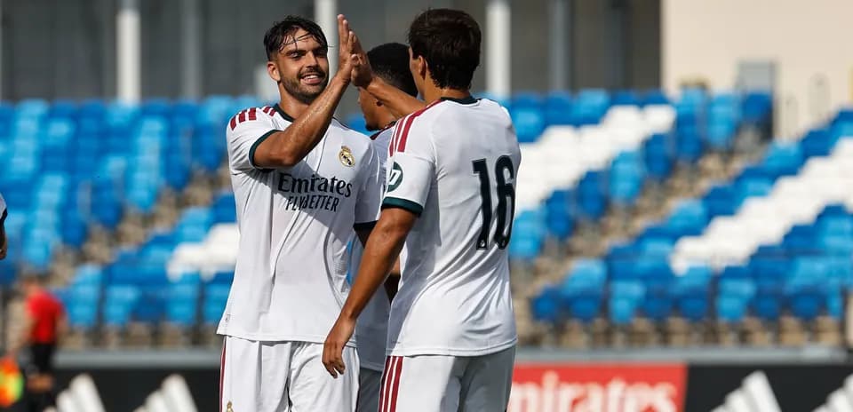 Players celebrating together during a training session