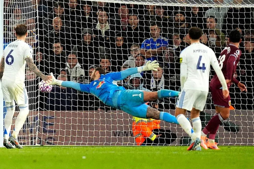 Goalkeeper making a diving save during match