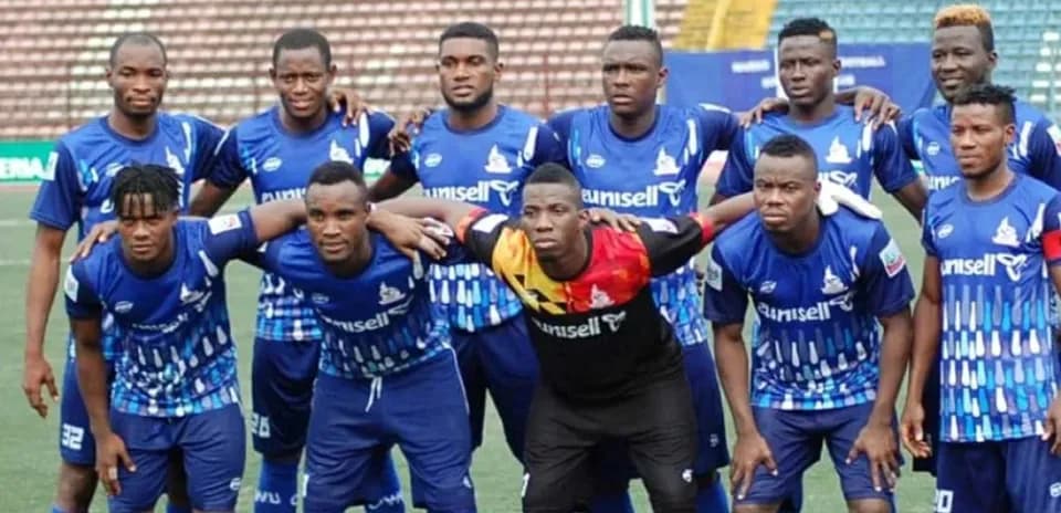 Rivers United team posing before a match