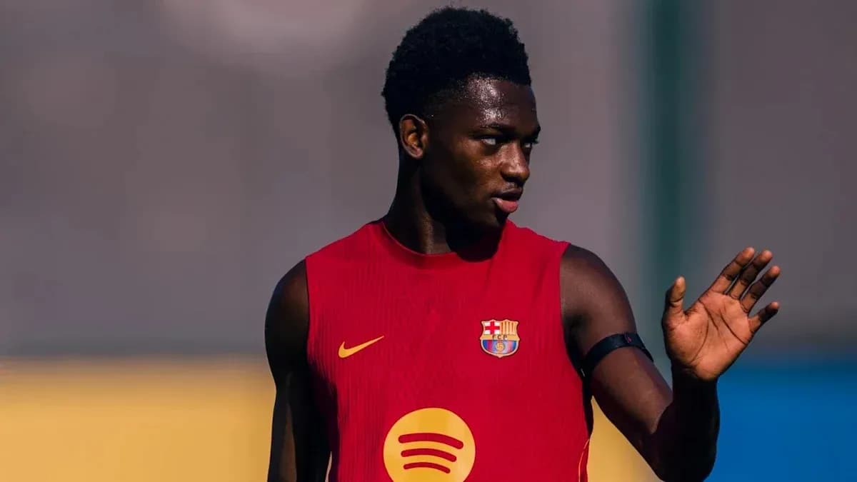Player in red training kit during practice session