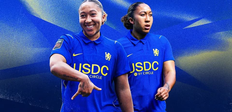 Player wearing Chelsea jersey, posing confidently