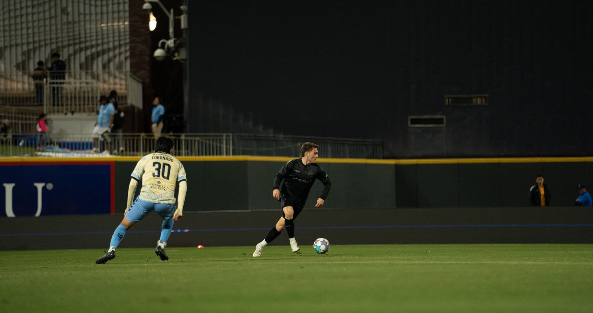 Player dribbling the ball during match