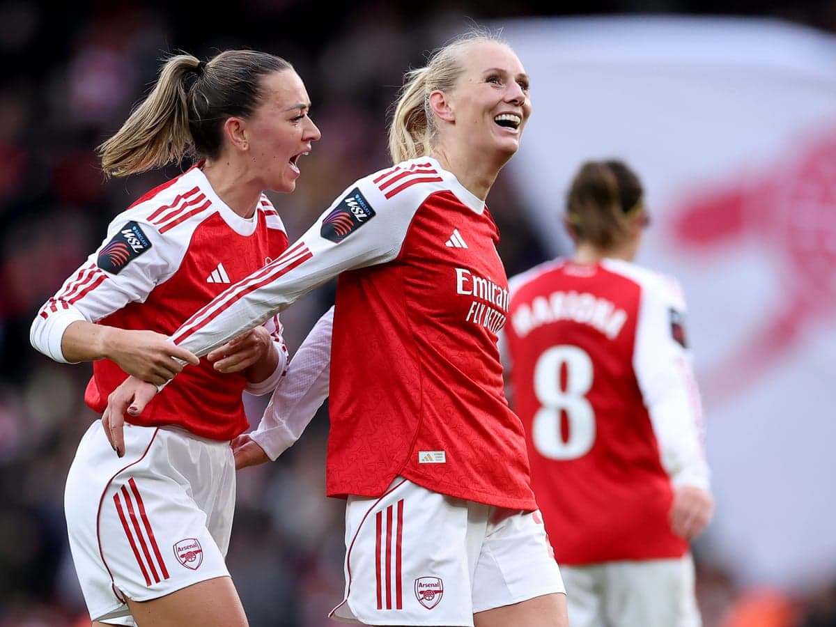 Arsenal players celebrating a goal during match Arsenal players celebrating a goal during match