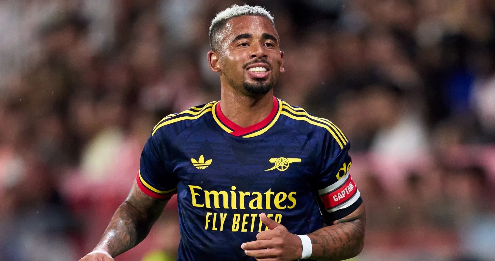 Player wearing Arsenal jersey during match