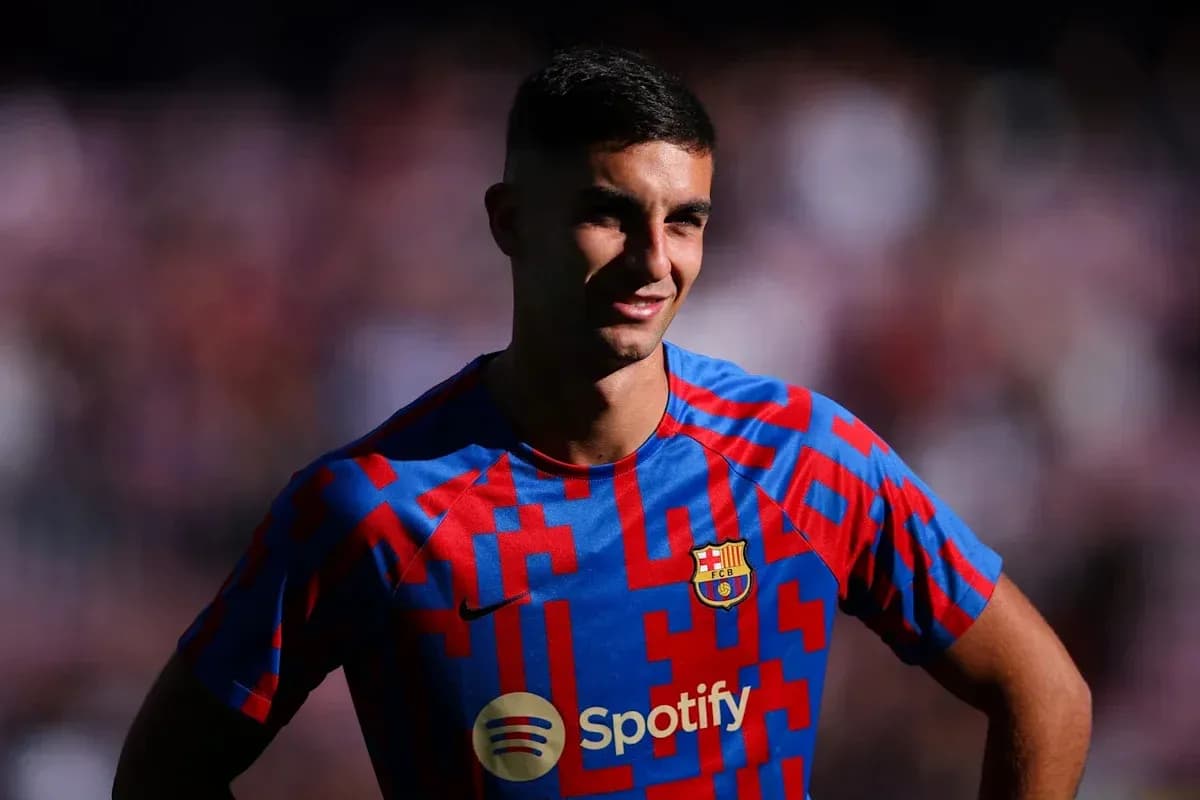 Football player posing in FC Barcelona jersey