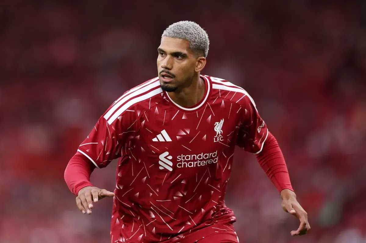Player in red Liverpool kit during match action