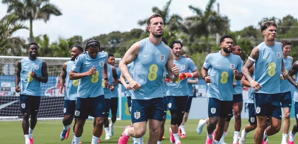 England players jogging during training session